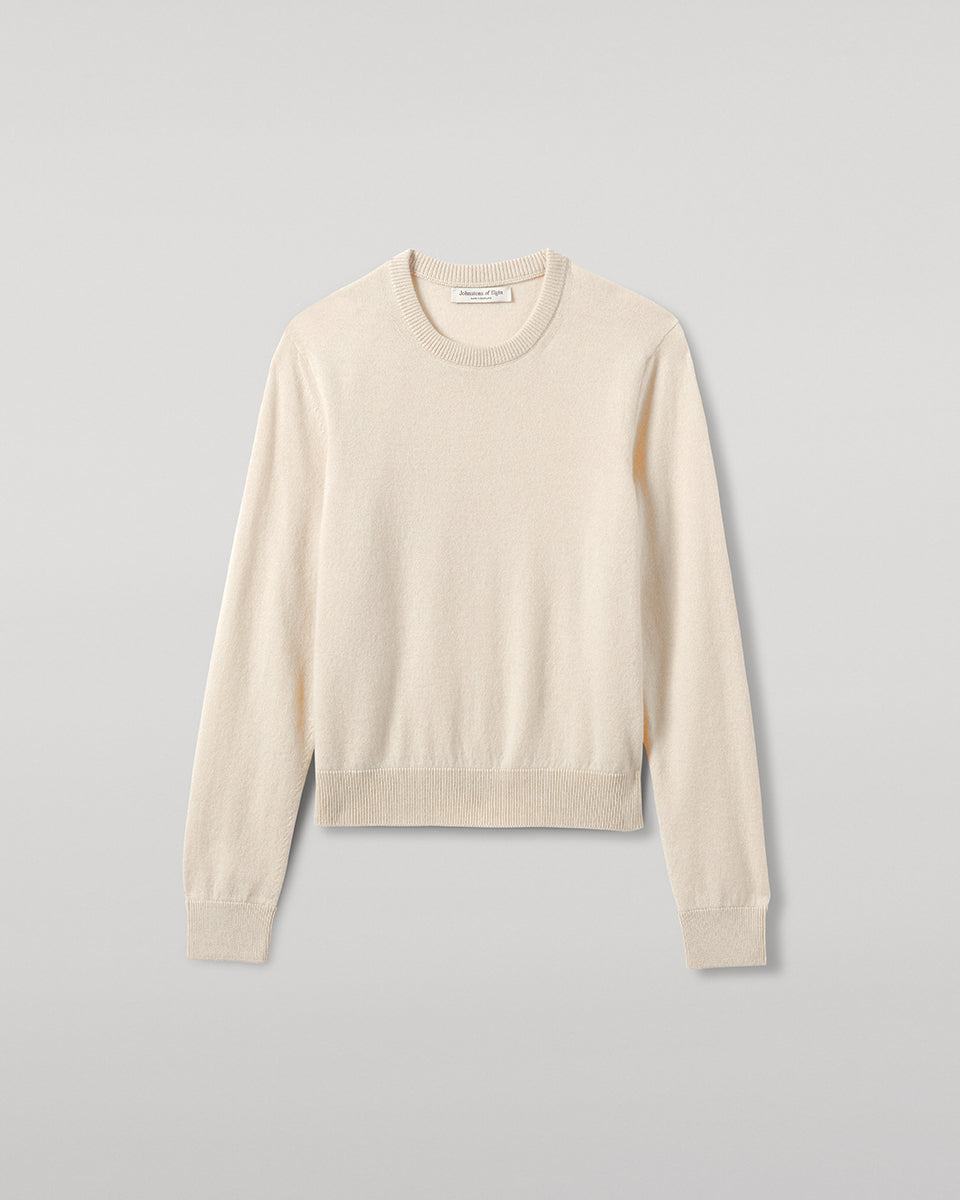 Johnstons of Elgin AW25 Women's Knitwear Champagne Classic Cashmere Cream Round Neck Jumper close up KAP05572SA0502