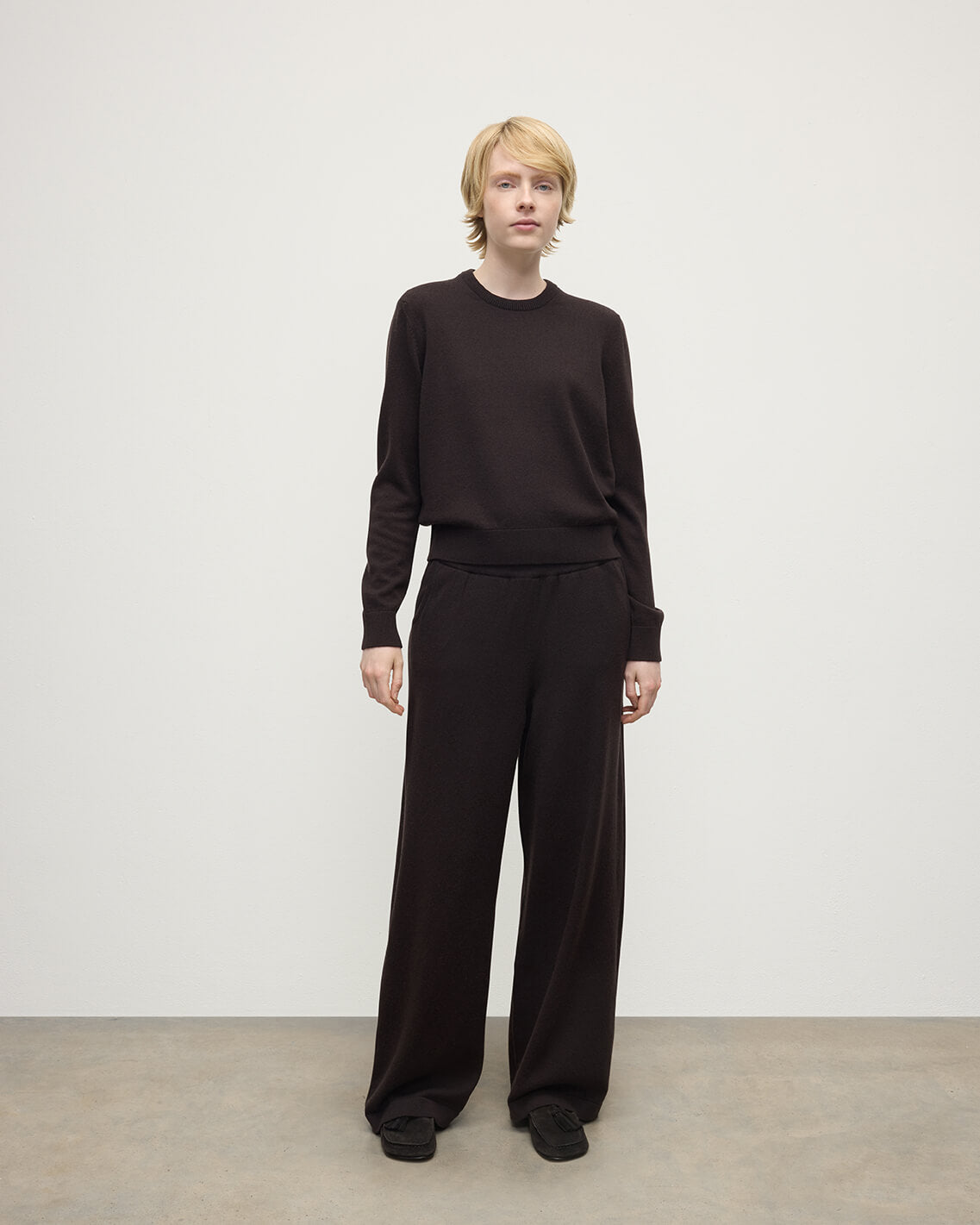 Model wearing Johnstons of Elgin AW25 Women's Knitwear Molasses Classic Cashmere Brown Round Neck Jumper Front View KAP05572SB7290