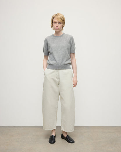 Model wearing Johnstons of Elgin AW25 Women's Knitwear Light Grey Classic Cashmere Grey T-shirt Front KAP05574HA0308