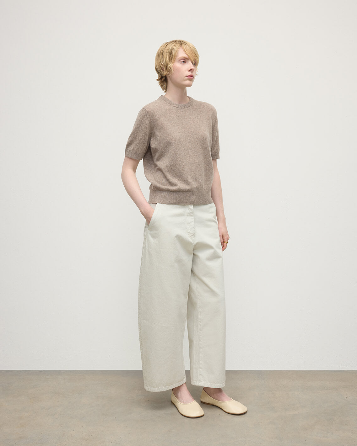 Model wears Johnstons of Elgin AW25 Women's Knitwear Ash Classic Cashmere Brown T-shirt Side KAP05574HB4334