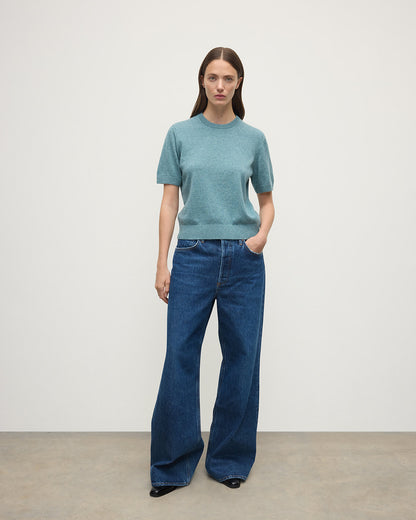 Model wears Johnstons of Elgin AW25 Women's Knitwear Seascape Classic Cashmere Green T-shirt Front View KAP05574HC0038