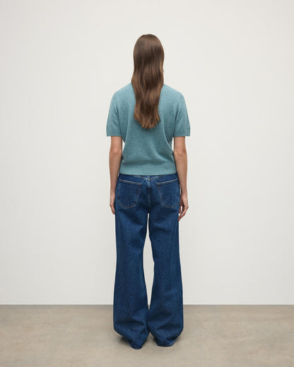 Model wears Johnstons of Elgin AW25 Women's Knitwear Seascape Classic Cashmere Green T-shirt Back View KAP05574HC0038