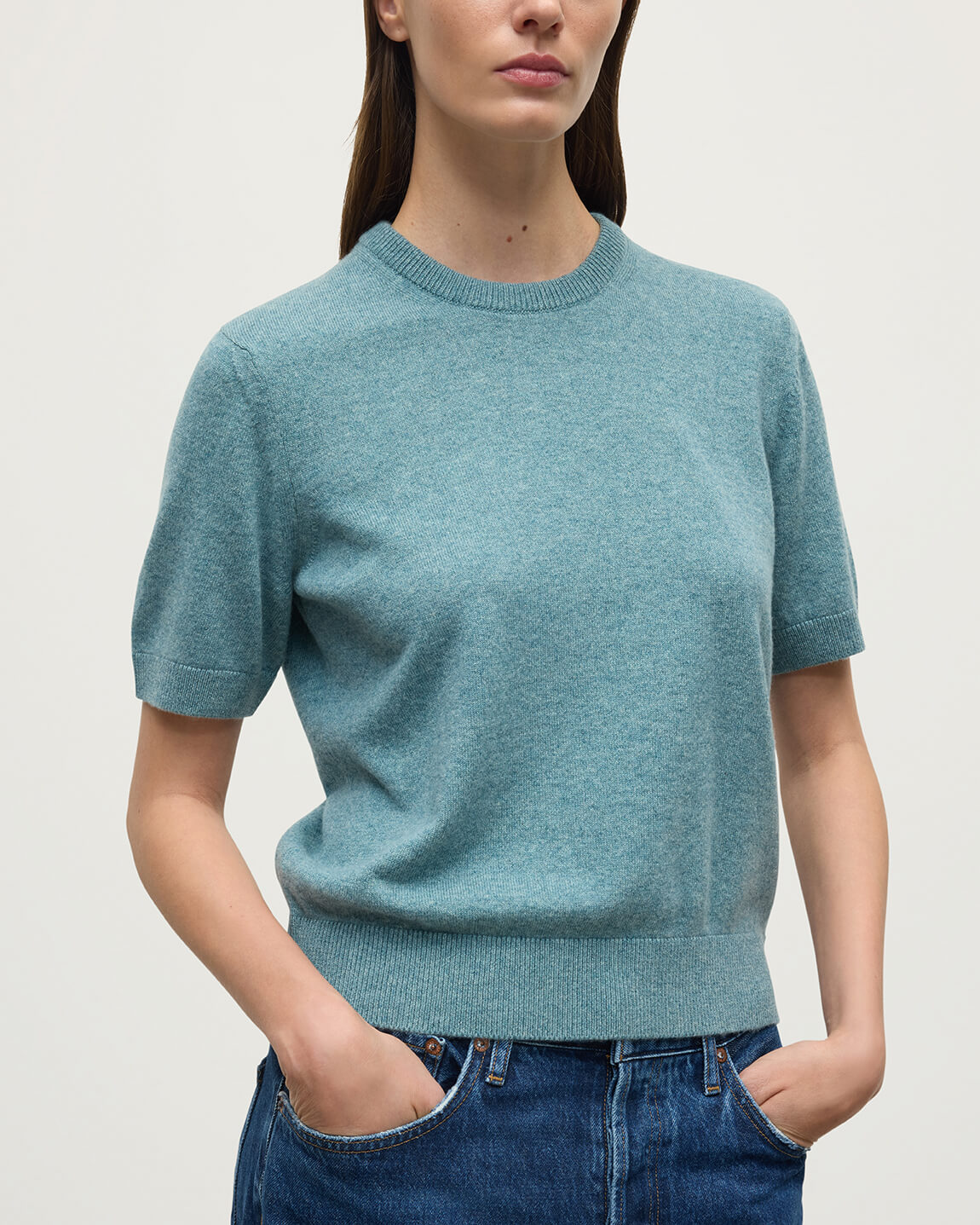Model wears Johnstons of Elgin AW25 Women's Knitwear Seascape Classic Cashmere Green T-shirt Close Up KAP05574HC0038