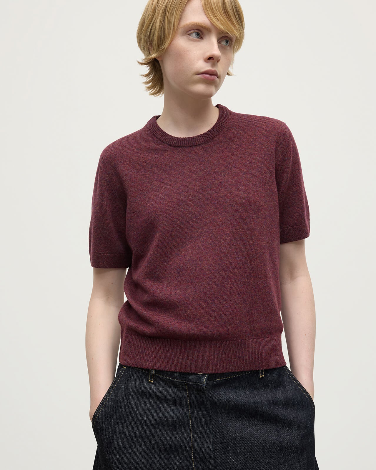Model wears Johnstons of Elgin AW25 Women's Knitwear Damson Classic Cashmere Purple T-shirt Close Up KAP05574HE7064