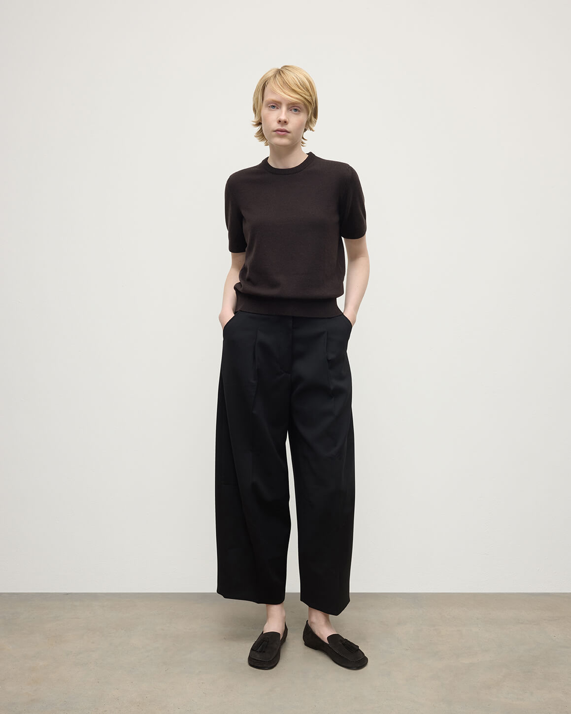 Model wearing Johnstons of Elgin AW25 Women's Knitwear Molasses Classic Cashmere Brown T-shirt Front KAP05574SB7290