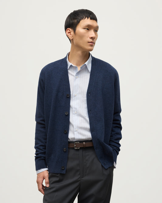 MODEL WEARS JOHNSTONS OF ELGIN MENS RORY VEE NECK CLASSIC CARDIGAN NAVY 100% CASHMERE KAP05576HD7350
