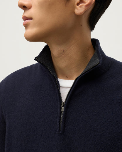MODEL WEARS JOHNSTONS OF ELGIN MENS RORY CLASSIC HALF ZIP SWEATER CONTRAST TRIM NAVY & CHARCOAL 100% CASHMERE, OVER A WHITE T-SHIRT KAP05577Q26187