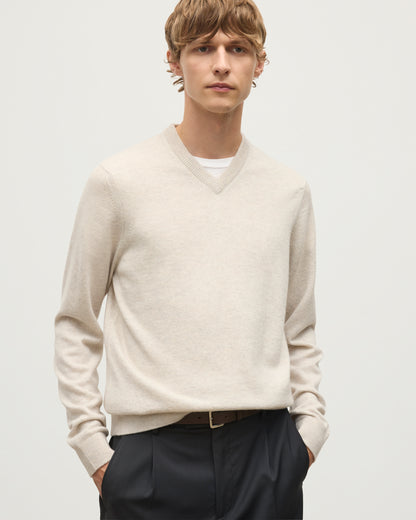 MODEL WEARS JOHNSTONS OF ELGIN MENS RORY VEE NECK CLASSIC JUMPER NATURAL 100% CASHMERE KAP05594HA0402