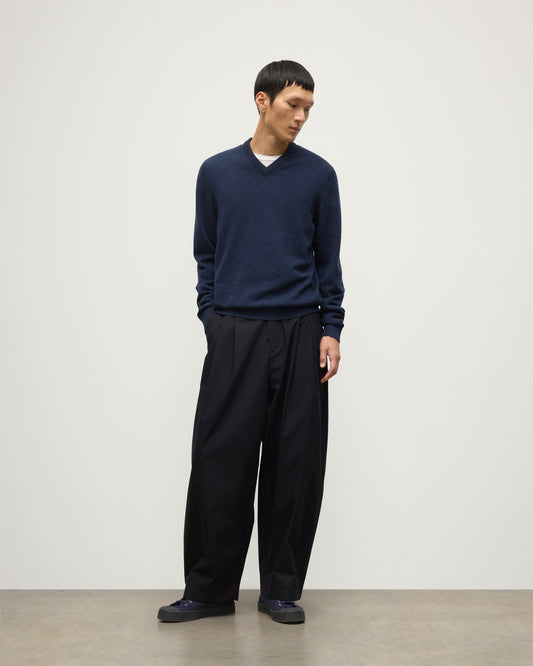 MODEL WEARS JOHNSTONS OF  ELGIN MENS RORY VEE NECK CLASSIC JUMPER 100% CASHMERE WITH NAVY TROUSERS KAP05594HD7350