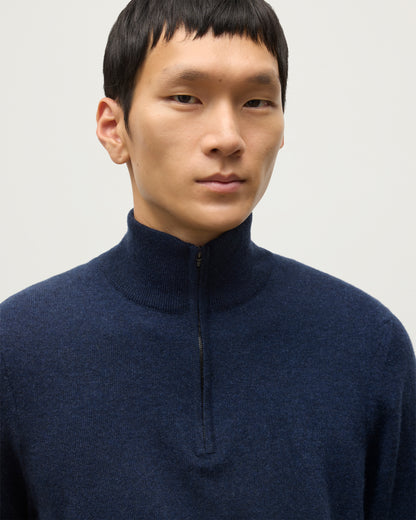 MODEL WEARS JOHNSTONS OF ELGIN MENS RORY CLASSIC HALF ZIP CLASSIC SWEATER 100% CASHMERE  OVER A WHITE T-SHIRT  KAP05695HD7350