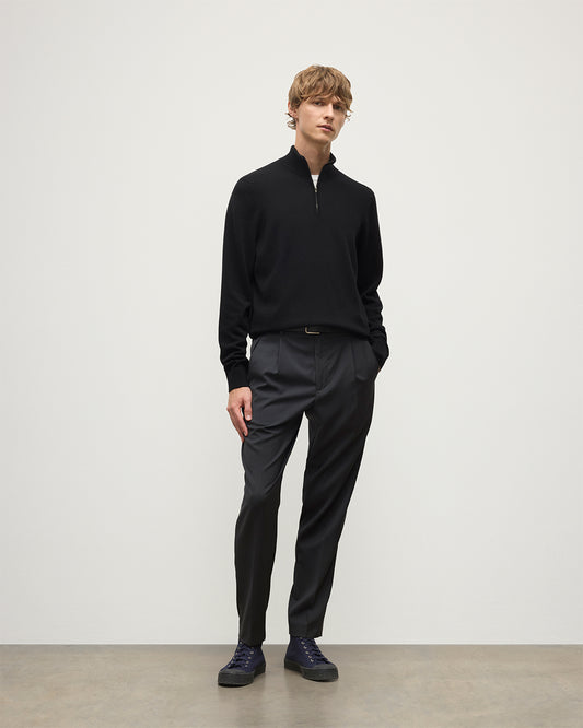 Model wearing Johnstons of Elgin AW25 Men's Knitwear Black Classic Cashmere Black Zip Neck Jumper KAP05695SA7210