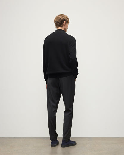 Model wears Johnstons of Elgin Men's Knitwear Rory Black Classic Cashmere Black Zip Neck Jumper KAP05695SA7210