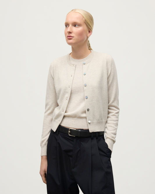 MODEL WEARING JOHNSTONS OF ELGIN WOMENS IRIS CLASSIC CREW CARDIGAN NATURAL 100% CASHMERE KAP05704HA0402