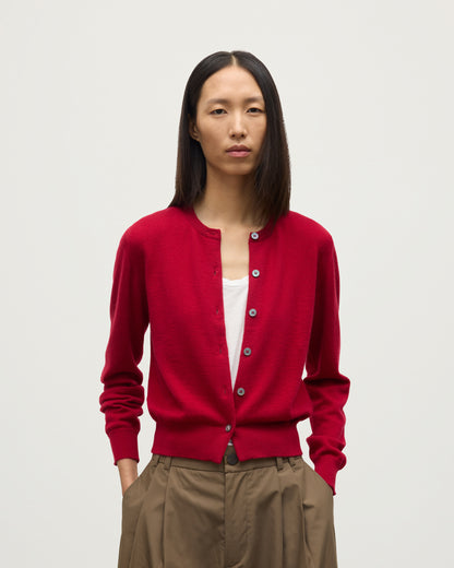 MODEL WEARS JOHNSTONS OF ELGIN WOMENS IRIS CLASSIC CREW CARDIGAN RED 100% CASHMERE KAP05704SE5325