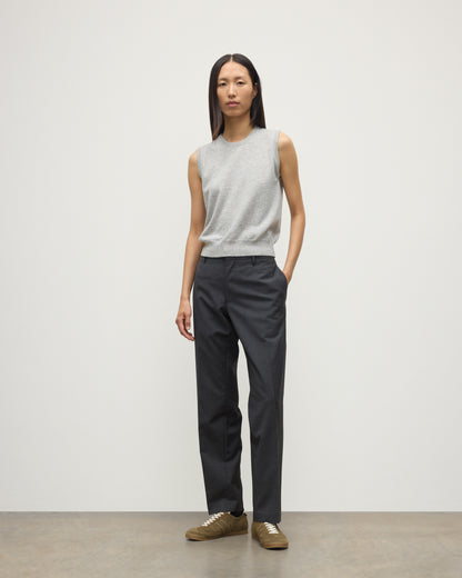 MODEL WEARS JOHNSTONS OF ELGIN WOMENS IRIS CLASSIC SLEEVELESS CREW GREY 100% CASHMERE WITH GREY TROUSERS KAP05705HA0399