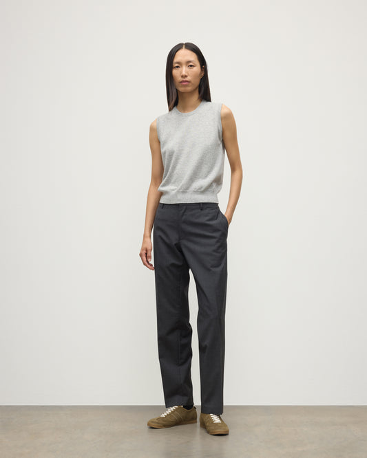 MODEL WEARS JOHNSTONS OF ELGIN WOMENS IRIS CLASSIC SLEEVELESS CREW GREY 100% CASHMERE WITH GREY TROUSERS KAP05705HA0399