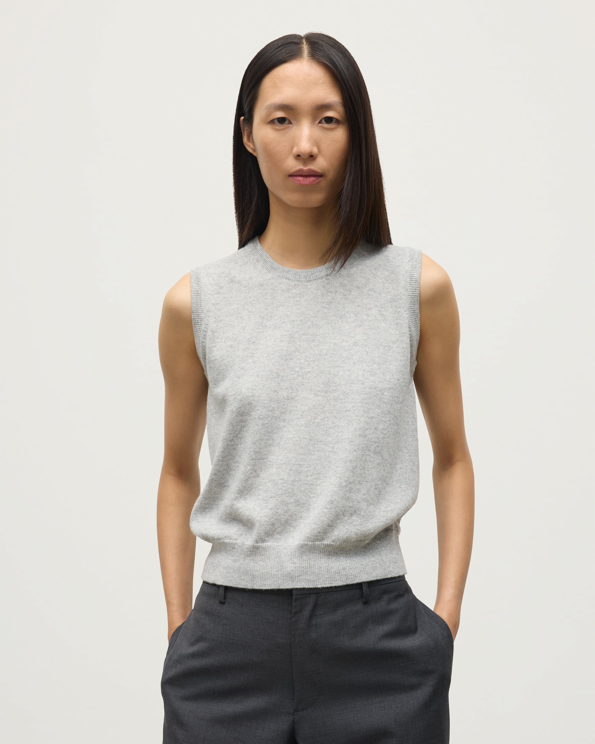 MODEL WEARS JOHNSTONS OF ELGIN WOMENS IRIS CLASSIC SLEEVELESS CREW GREY 100% CASHMERE KAP05705HA0399