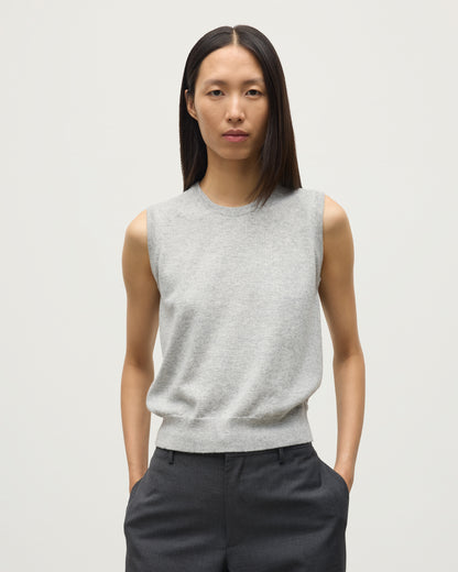 MODEL WEARS JOHNSTONS OF ELGIN WOMENS IRIS CLASSIC SLEEVELESS CREW GREY 100% CASHMERE KAP05705HA0399