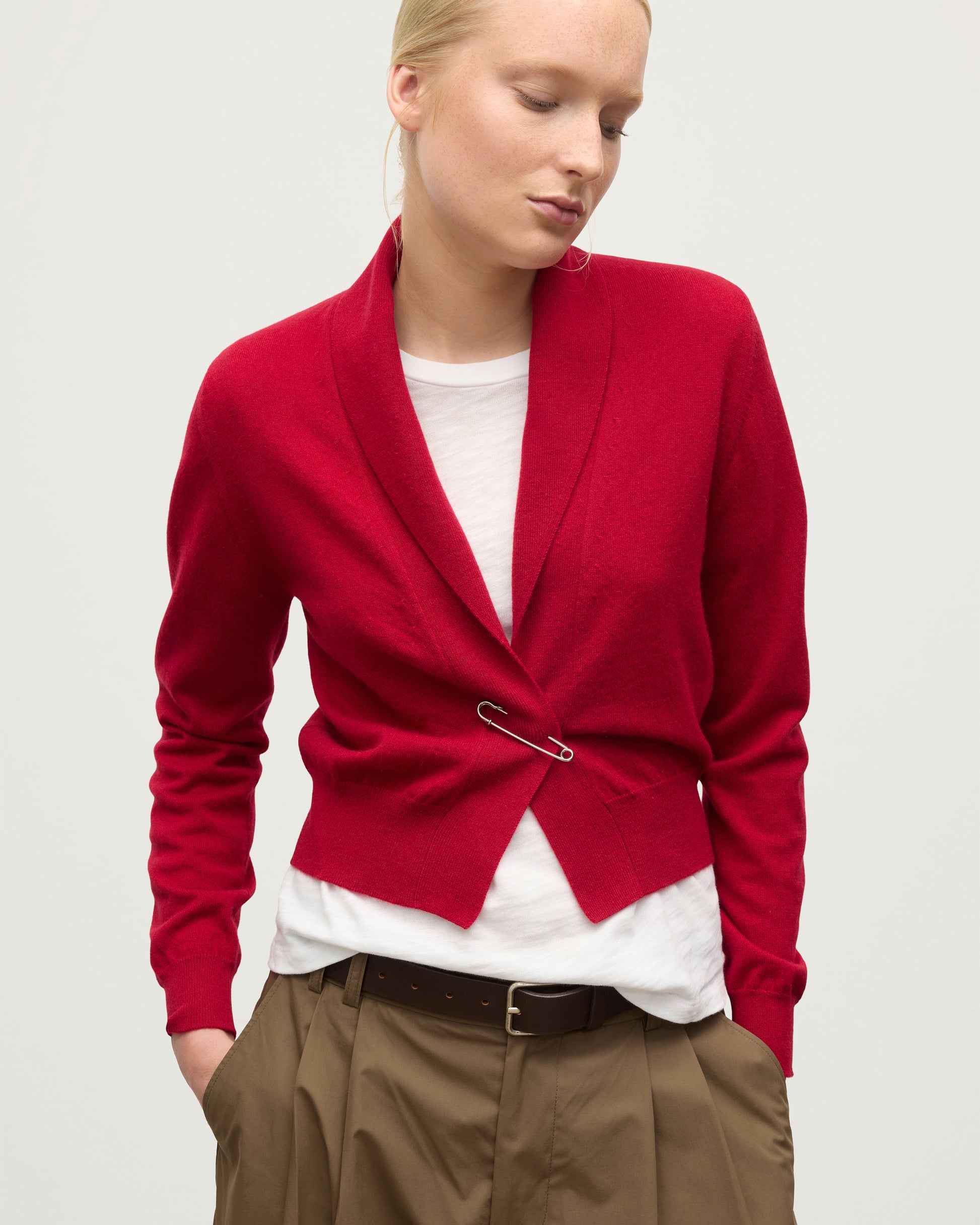 MODEL WEARS JOHNSTONS OF ELGIN WOMENS CRATHIE SHAWL CARDIGAN RED 100% CASHMERE WITH KILT PIN FASTENING KAP05707SE5325