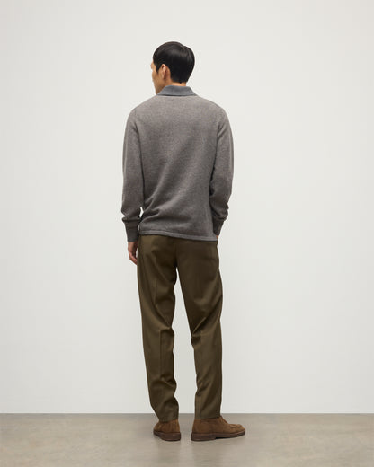 MODEL WEARS JOHNSTONS OF ELGIN MENS TWEEL RUGBY SHIRT 100% CASHMERE OVER A WHITE T-SHIRT WITH OLIVE GREEN TROUSERS KAP05727Q25939