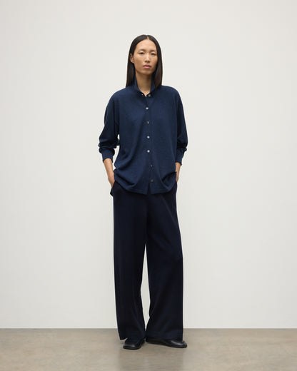 MODEL WEARS JOHNSTONS OF ELGIN WOMENS MUNRO SHIRT NAVY 100% CASHMERE WITH CASHMERE CULOTTES KAP05765HD7350