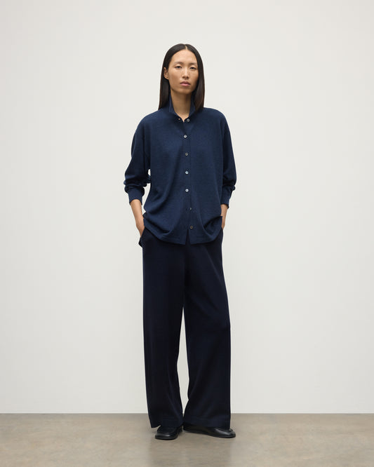 MODEL WEARS JOHNSTONS OF ELGIN WOMENS MUNRO SHIRT NAVY 100% CASHMERE WITH CASHMERE CULOTTES KAP05765HD7350