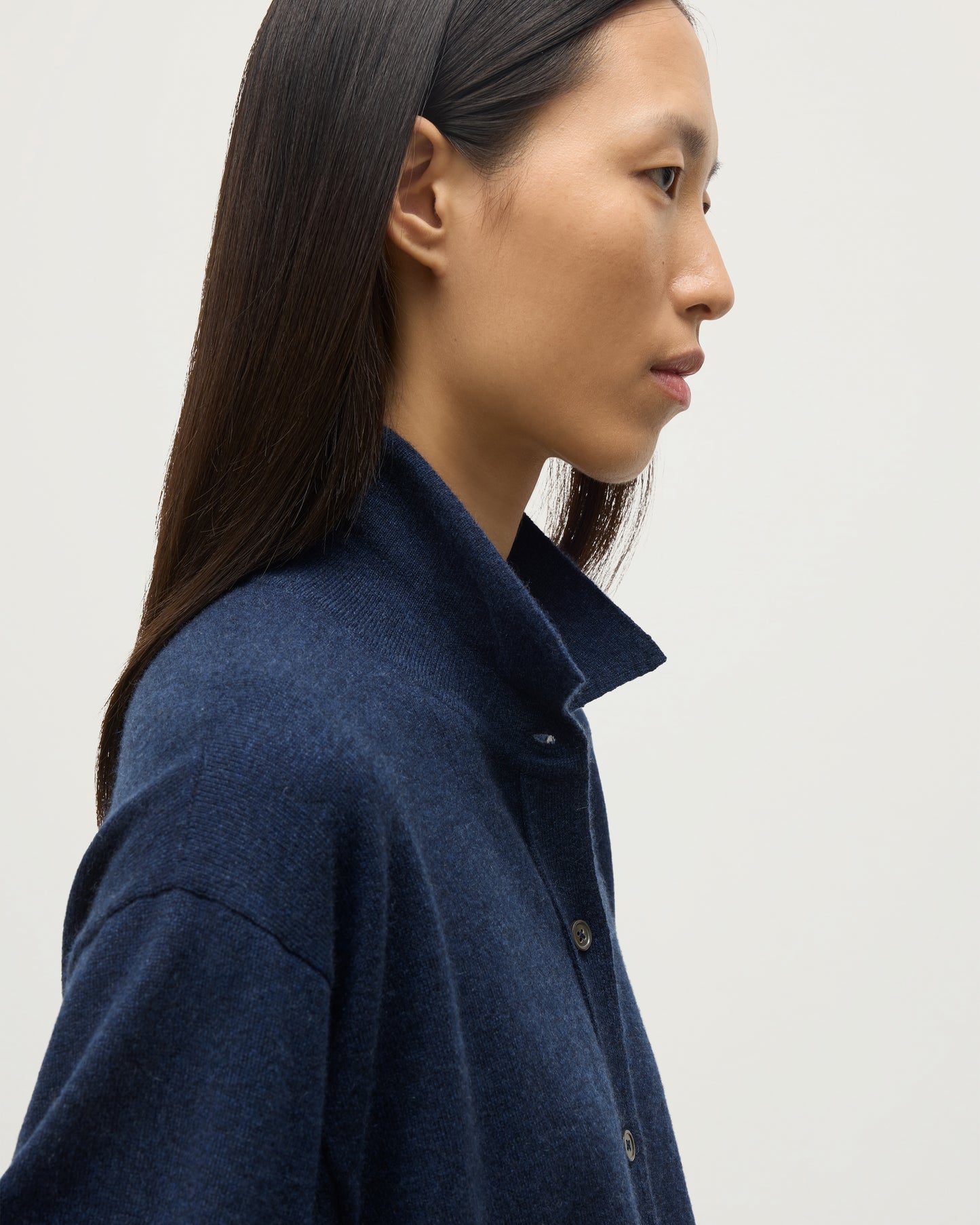 MODEL WEARS JOHNSTONS OF ELGIN WOMENS MUNRO SHIRT NAVY 100% CASHMERE WITH CASHMERE CULOTTES KAP05765HD7350