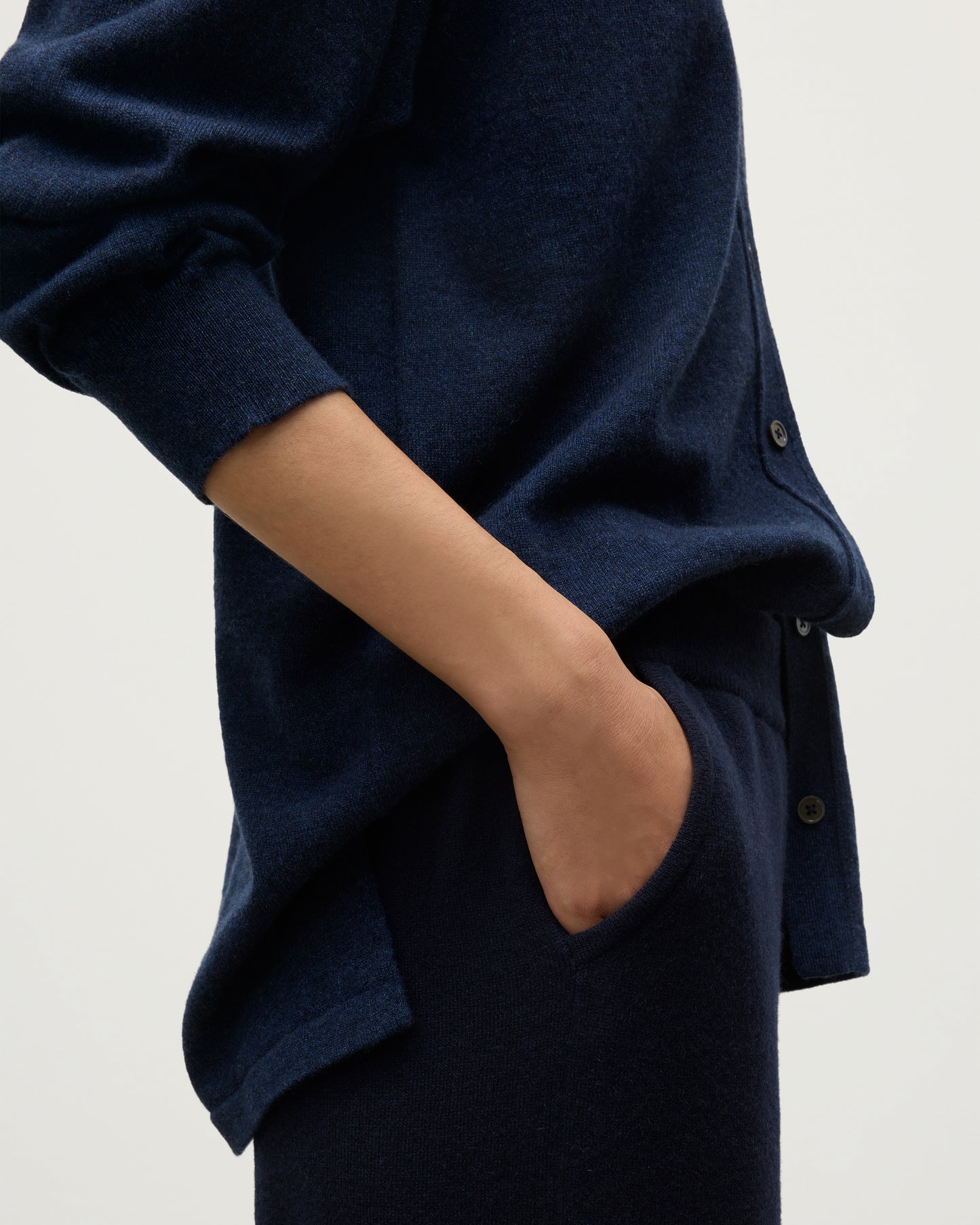 MODEL WEARS JOHNSTONS OF ELGIN WOMENS MUNRO SHIRT NAVY 100% CASHMERE WITH CASHMERE CULOTTES KAP05765HD7350