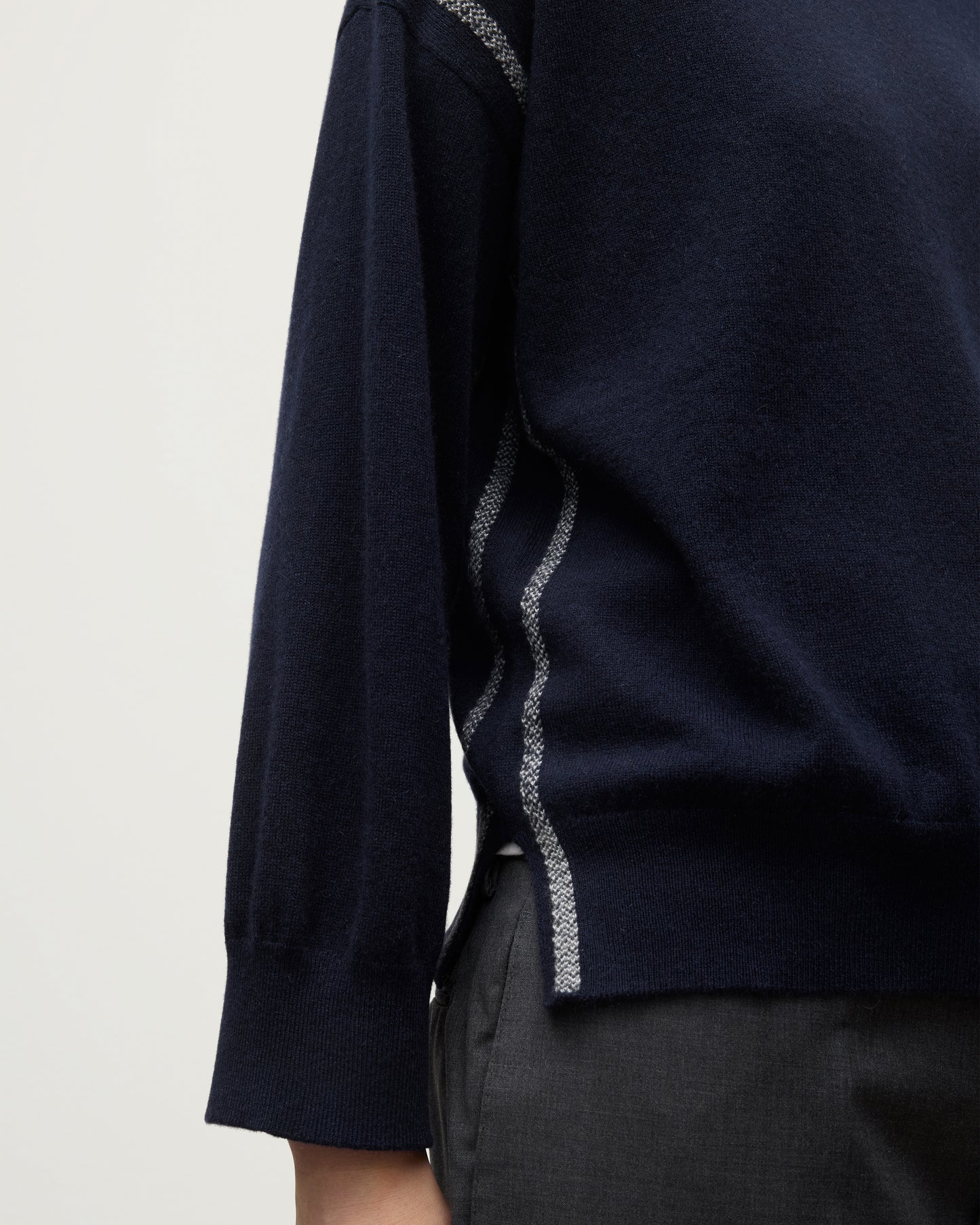 MODEL WEARING JOHNSTONS OF ELGIN WOMENS TILDA CREW SWEATER NAVY WITH GREY TROUSERS KAP05768Q25971