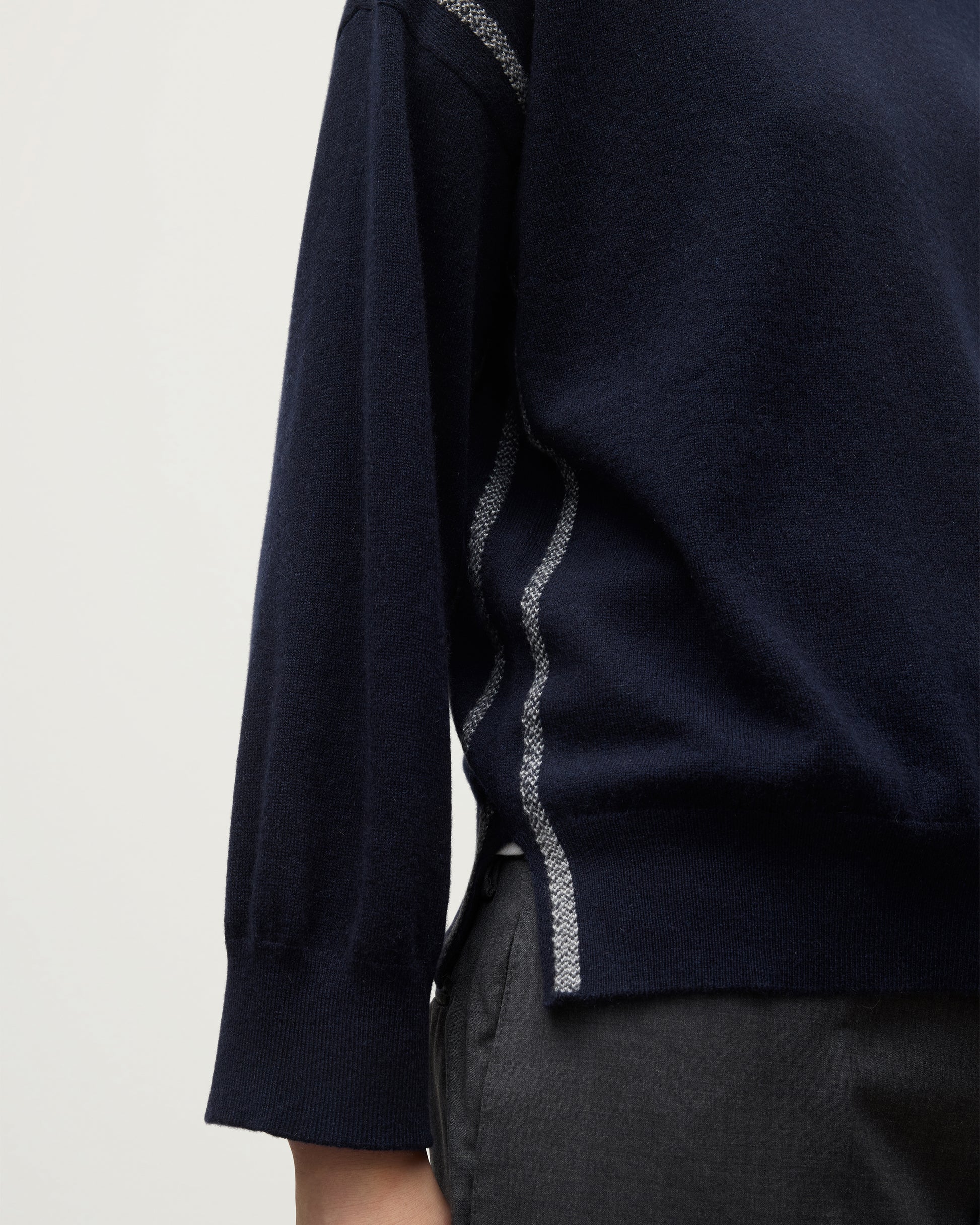 MODEL WEARING JOHNSTONS OF ELGIN WOMENS TILDA CREW SWEATER NAVY WITH GREY TROUSERS KAP05768Q25971