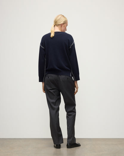 MODEL WEARING JOHNSTONS OF ELGIN WOMENS TILDA CREW SWEATER NAVY WITH GREY TROUSERS KAP05768Q25971