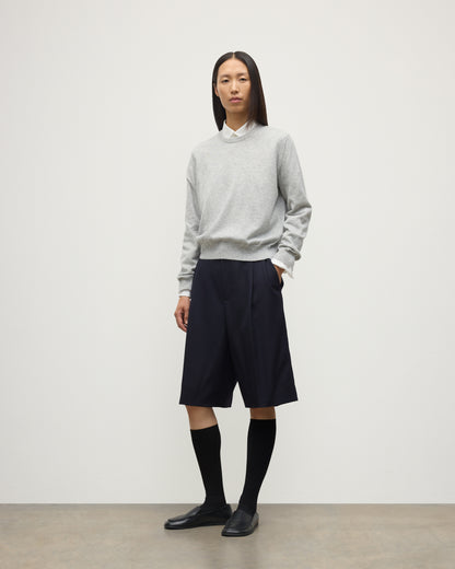 MODEL WEARING JOHNSTONS OF ELGIN WOMENS LUNAN CLASSIC CREW SWEATER GREY WITH BLACK LONG SHIRTS KAP05784HA0399