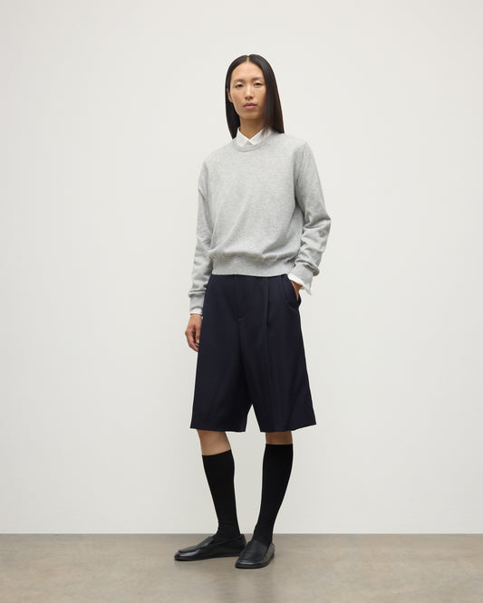 MODEL WEARING JOHNSTONS OF ELGIN WOMENS LUNAN CLASSIC CREW SWEATER GREY WITH BLACK LONG SHIRTS KAP05784HA0399