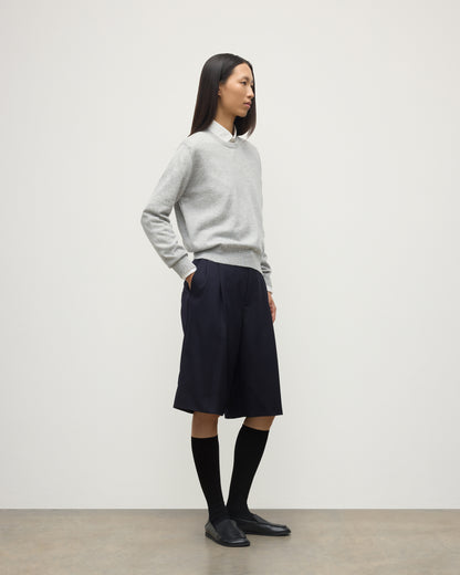 MODEL WEARING JOHNSTONS OF ELGIN WOMENS LUNAN CLASSIC CREW SWEATER GREY WITH BLACK LONG SHIRTS KAP05784HA0399