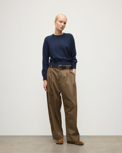 MODEL WEARS JOHNSTONS OF ELGIN WOMENS LUNAN CLASSIC CREW SWEATER NAVY WITH BROWN WIDE LEG TROUSERS KAP05784HD7350