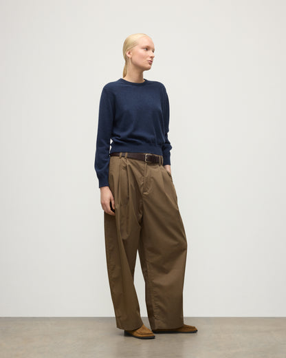 MODEL WEARS JOHNSTONS OF ELGIN WOMENS LUNAN CLASSIC CREW SWEATER NAVY WITH BROWN WIDE LEG TROUSERS KAP05784HD7350