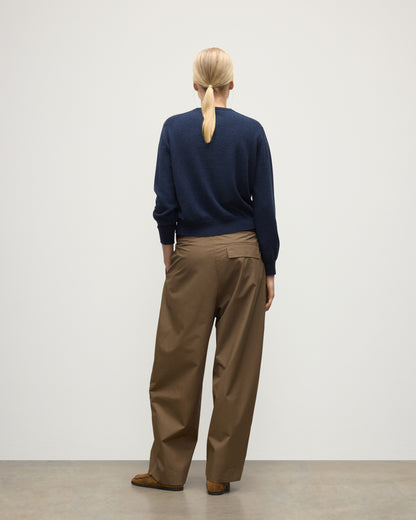 MODEL WEARS JOHNSTONS OF ELGIN WOMENS LUNAN CLASSIC CREW SWEATER NAVY WITH BROWN WIDE LEG TROUSERS KAP05784HD7350