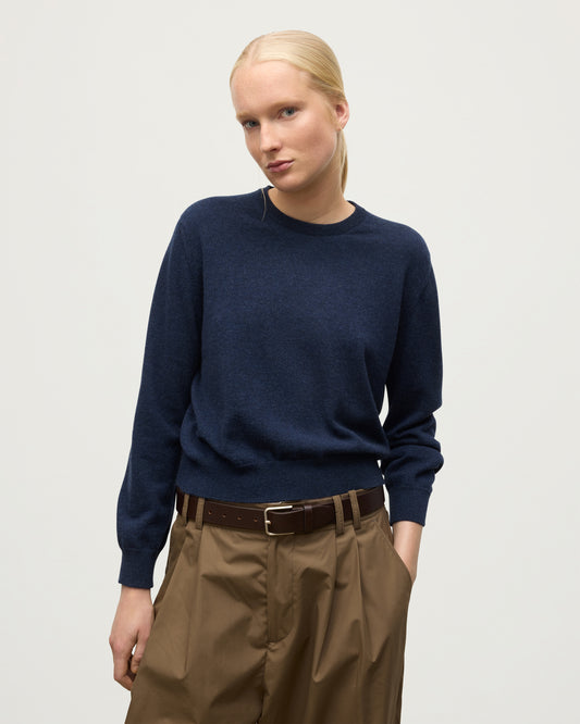 MODEL WEARS JOHNSTONS OF ELGIN WOMENS LUNAN CLASSIC CREW SWEATER NAVY KAP05784HD7350