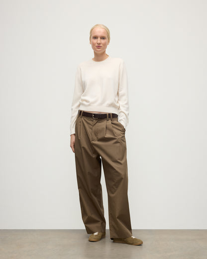 MODEL WEARS JOHNSTONS OF ELGIN WOMENS LUNAN CLASSIC CREW SWEATER WHITE WITH BROWN TROUSERS KAP05784SA0606