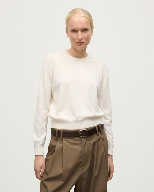 MODEL WEARS JOHNSTONS OF ELGIN WOMENS LUNAN CLASSIC CREW SWEATER WHITE KAP05784SA0606