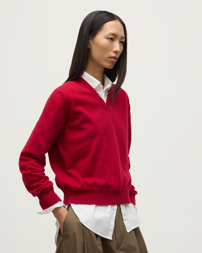 MODEL WEARING JOHNSTONS OF ELGIN WOMENS LUNAN CLASSIC VEE SWEATER RED 100% CASHMERE OVER WHITE SHIRT KAP05807SE5325