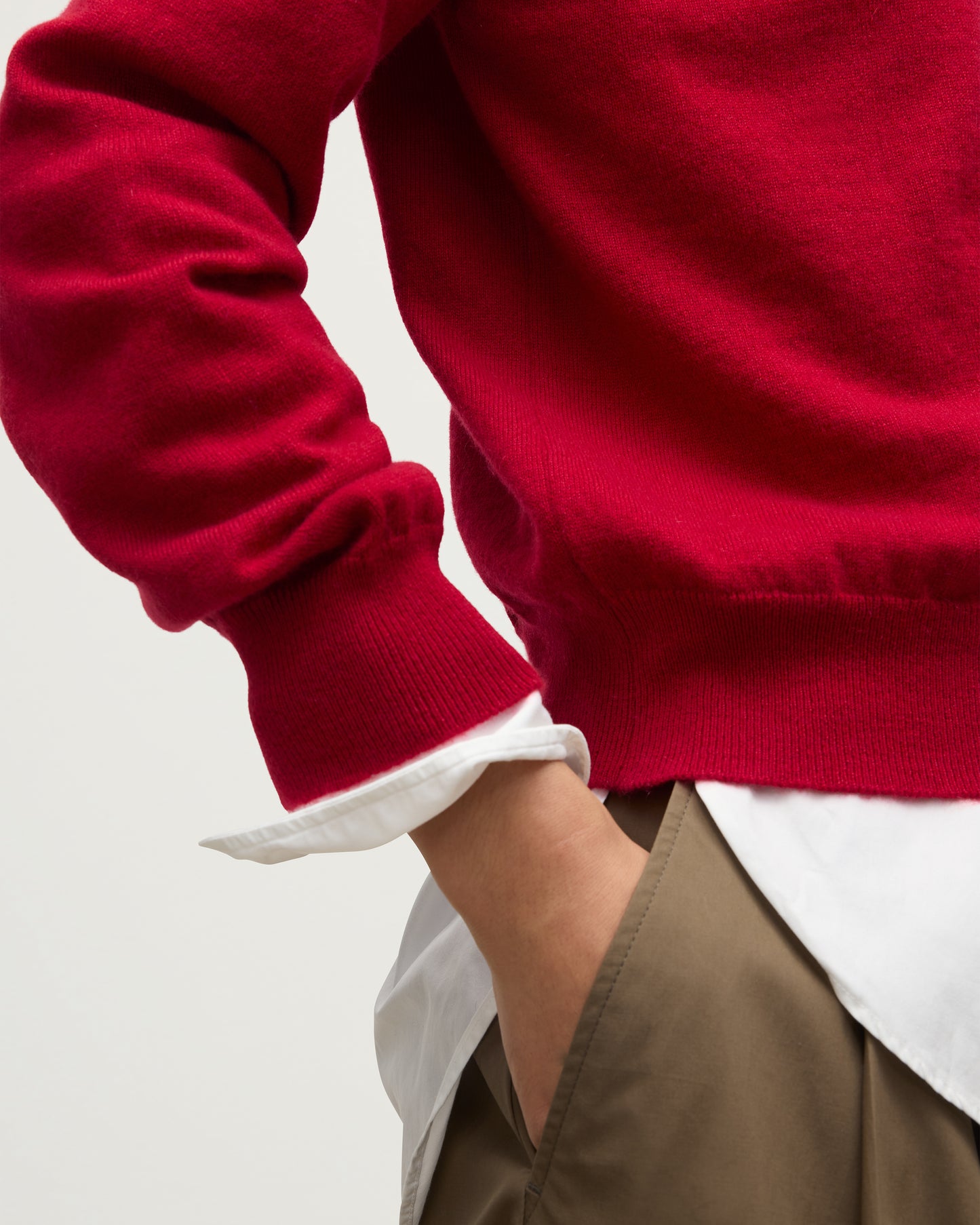 MODEL WEARING JOHNSTONS OF ELGIN WOMENS LUNAN CLASSIC VEE SWEATER RED 100% CASHMERE OVER WHITE SHIRT  KAP05807SE5325