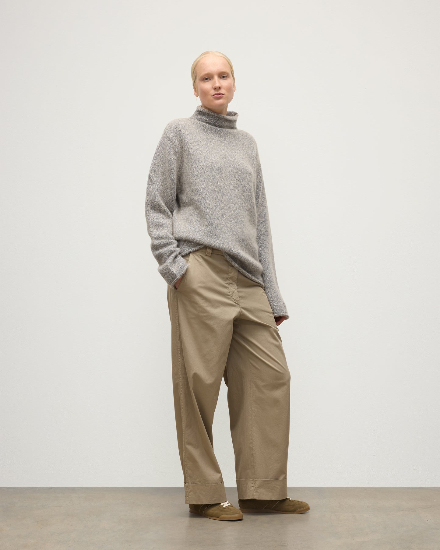 FEMALE MODEL WEARING JOHNSTONS OF ELGIN KESTER FUNNEL NECK SWEATER BLUE 100% CASHMERE UBB01067HD4499