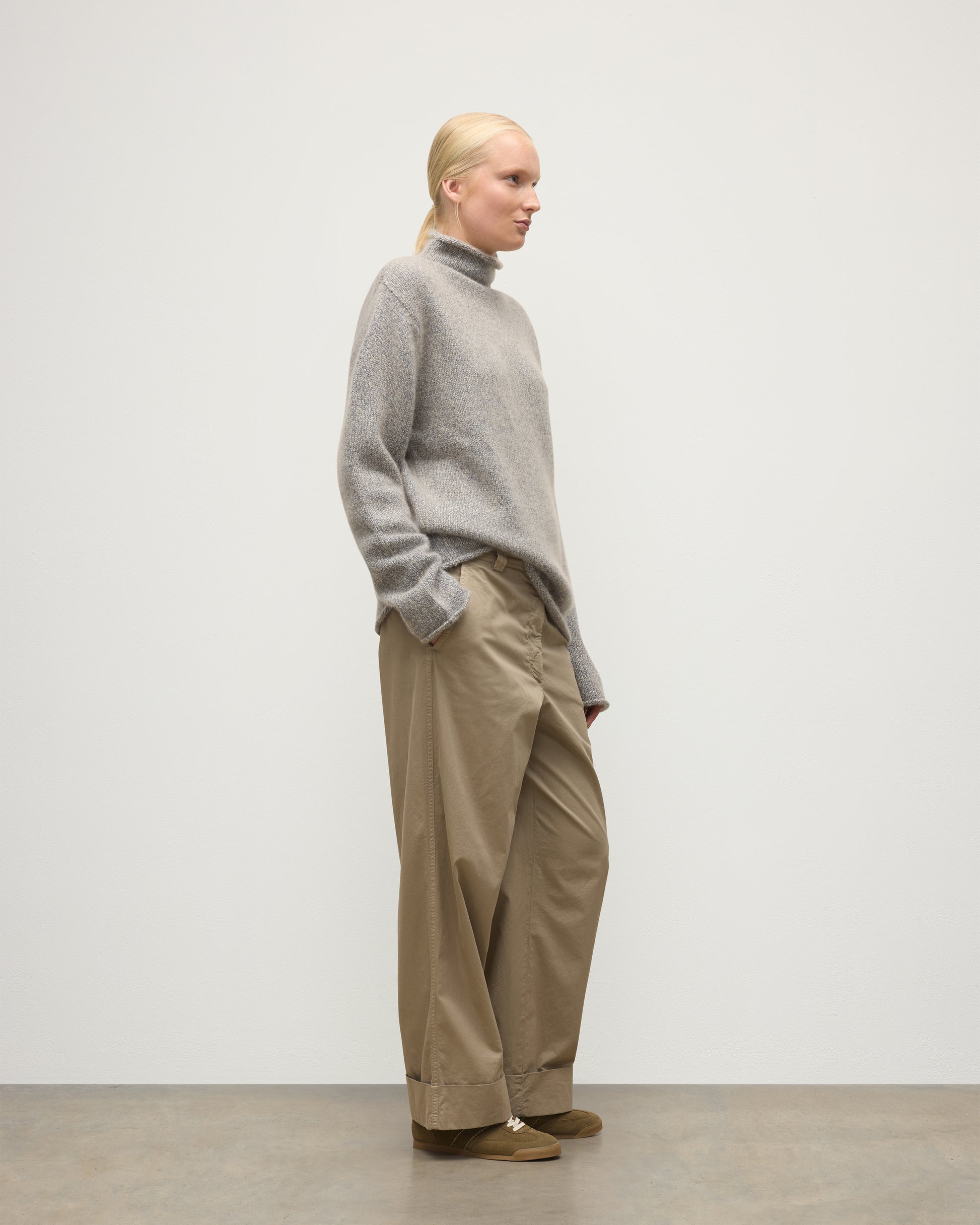 FEMALE MODEL WEARING JOHNSTONS OF ELGIN KESTER FUNNEL NECK SWEATER BLUE 100% CASHMERE UBB01067HD4499