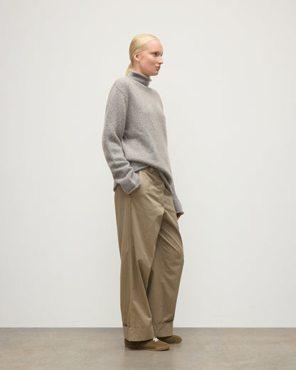 FEMALE MODEL WEARING JOHNSTONS OF ELGIN KESTER FUNNEL NECK SWEATER BLUE 100% CASHMERE UBB01067HD4499