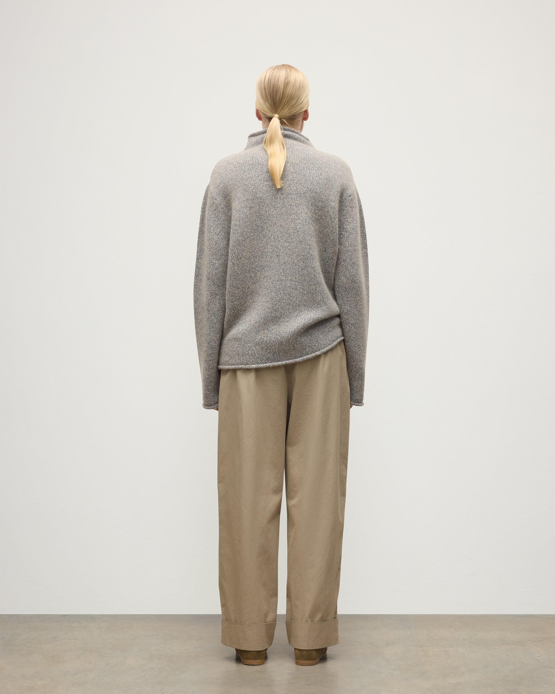 FEMALE MODEL WEARING JOHNSTONS OF ELGIN KESTER FUNNEL NECK SWEATER BLUE 100% CASHMERE UBB01067HD4499