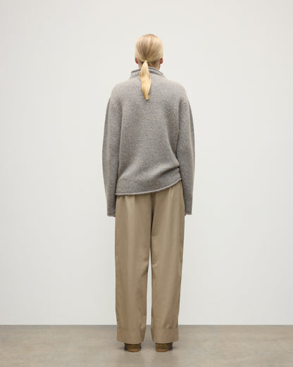 FEMALE MODEL WEARING JOHNSTONS OF ELGIN KESTER FUNNEL NECK SWEATER BLUE 100% CASHMERE UBB01067HD4499