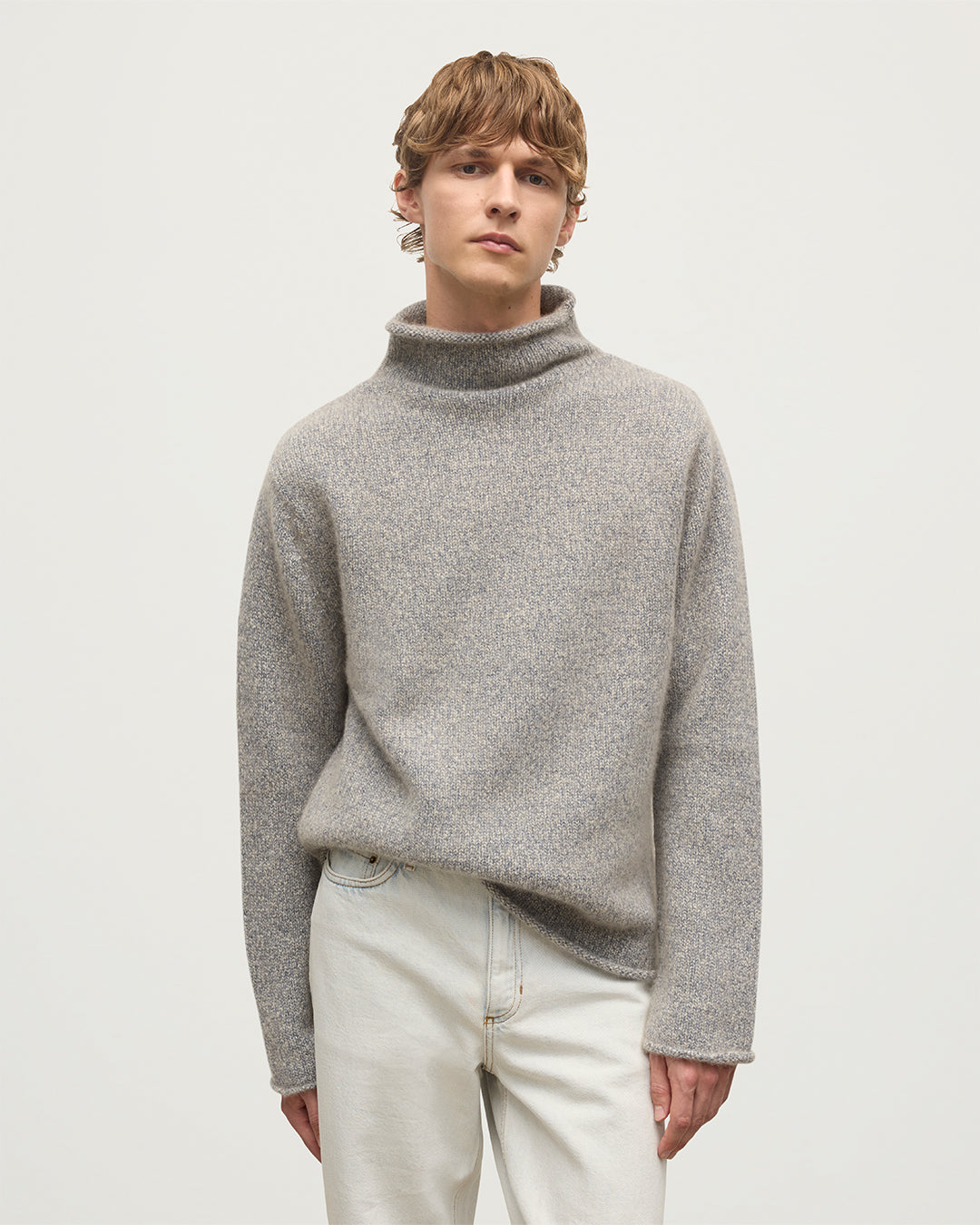 MALE MODEL WEARING JOHNSTONS OF ELGIN KESTER FUNNEL NECK SWEATER BLUE 100% CASHMERE KBB01067HB4453