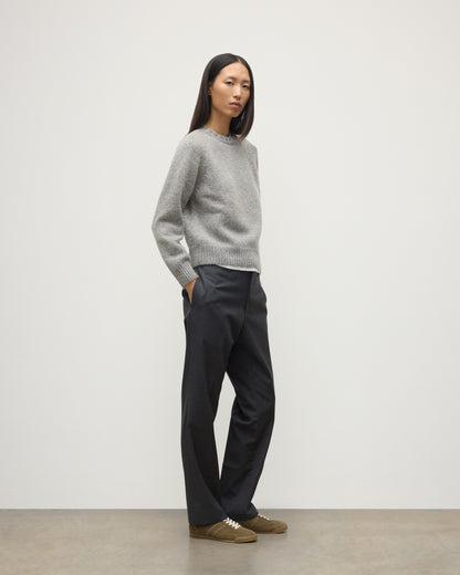 MODEL WEARS JOHNSTONS OF ELGIN WOMENS BAY CREW SWEATER BLUE 78% CASHMERE 22% COTTON WITH JEANS  KBB01068HD4499