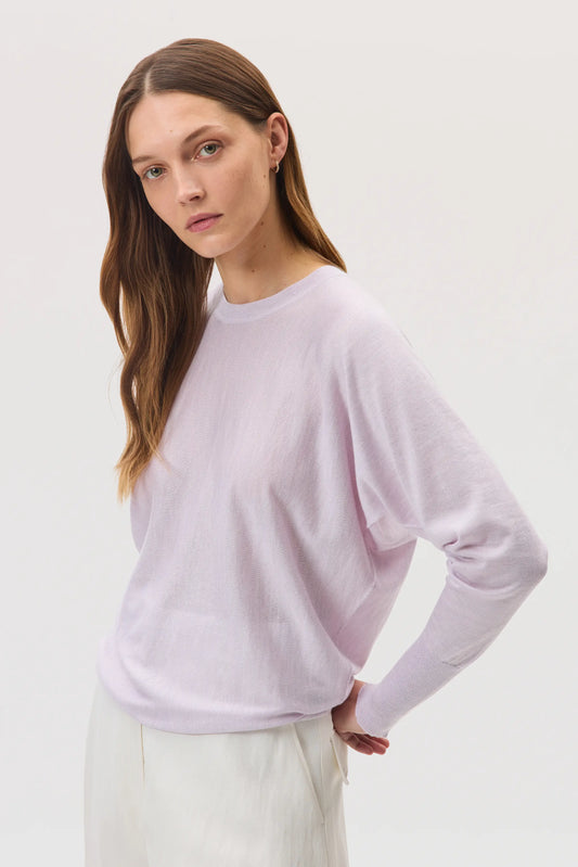 Johnstons of Elgin SS25 Women's Knitwear Lavender Cashmere Silk Batwing Jumper worn with white jeans KBI00975HD0088